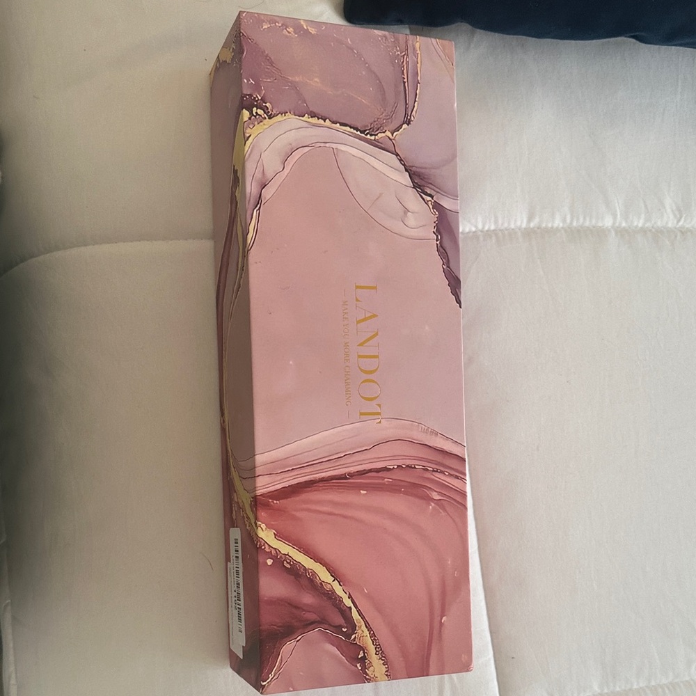 Landot rotating curling iron